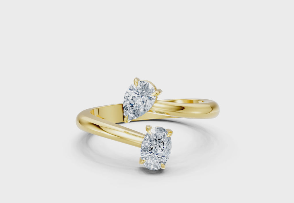 0.75 Carat Lab Grown Diamond Toi et Moi Pear and Oval Ring