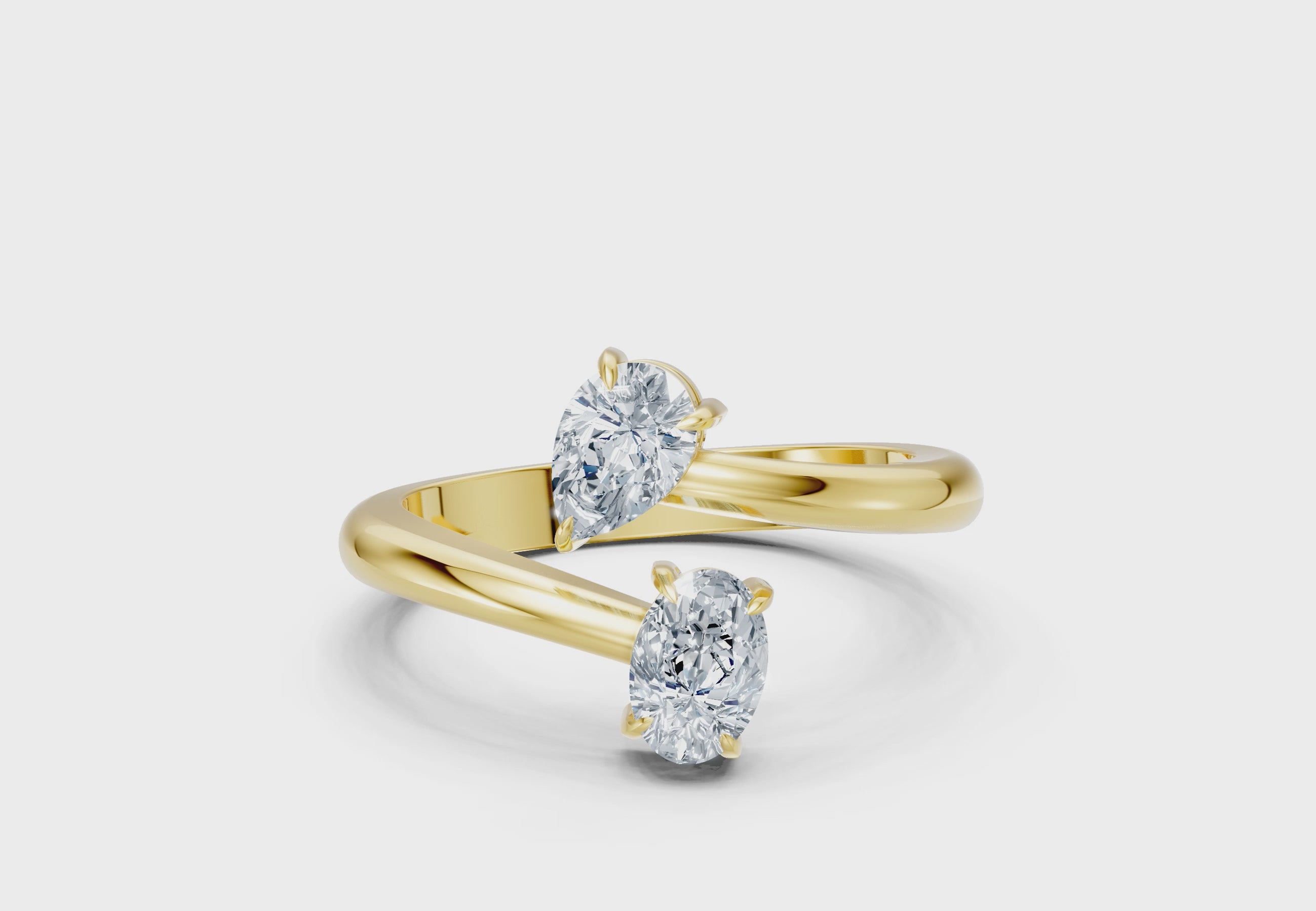 0.75 Carat Lab Grown Diamond Toi et Moi Pear and Oval Ring