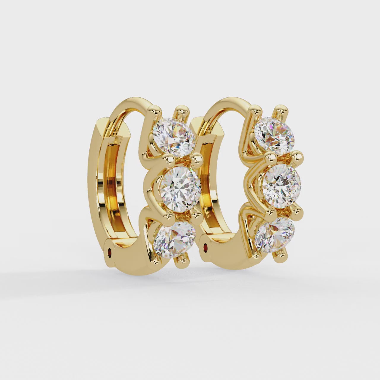 Trinity Glow Round-Cut Diamond Huggie Hoops in Gold