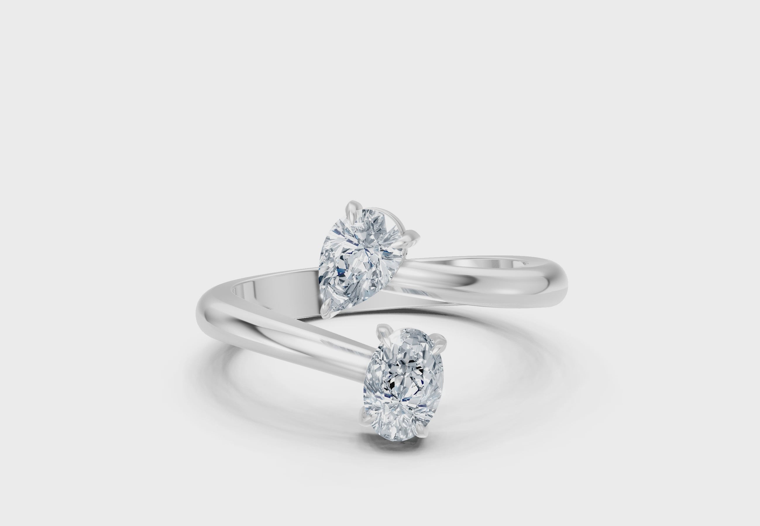 0.75 Carat Lab Grown Diamond Toi et Moi Pear and Oval Ring